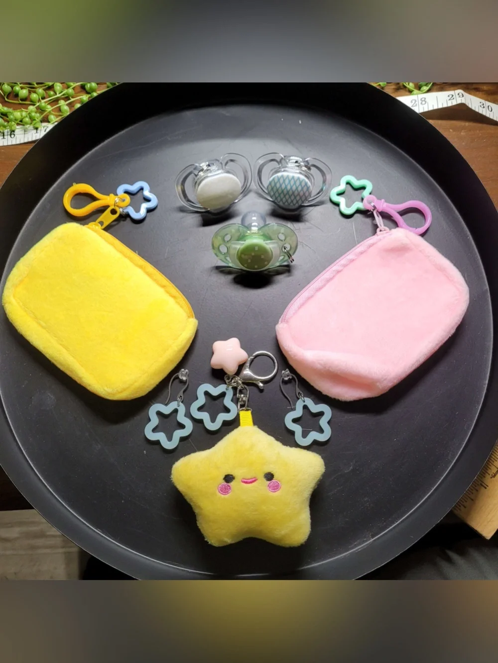 Rave festival earrings & bags, binkies, plush bag charms.